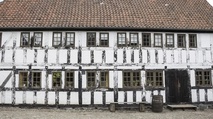 Framed Print : White timbered house, with a bench and rainbarrel in the old town Den Gamle By in Aarhus Denmark Framed Print : White timbered house, with a bench and rainbarrel in the old town Den Gamle By in Aarhus Denmark