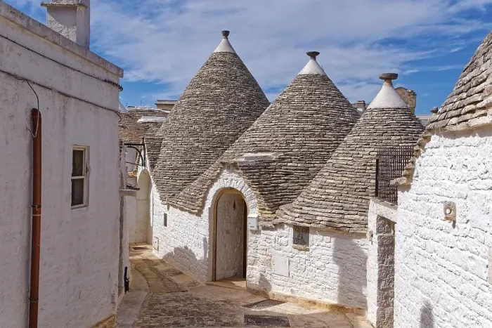 Framed Print : Whitewashed trulli, round houses with stone roofs