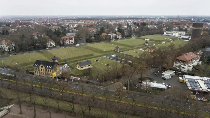 Framed Print : Wide-angle view of an urban area with a central water tower and surrounding green spaces