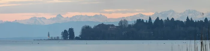 Framed Print : Wide view of mountains and lake under pastel colored sky