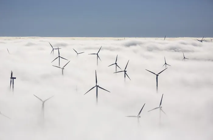 Framed Print : Wind turbines covered by low clouds Framed Print : Wind turbines covered by low clouds