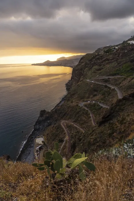 Framed Print : Winding road at Mirador de Cristo Rei at sunset in Funchal in summer