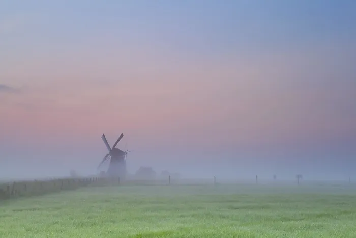 Framed Print : Windmill silhouette over sunrise sky
