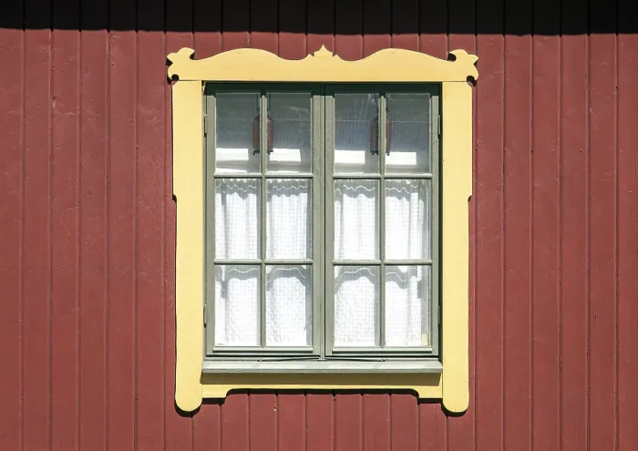 Framed Print : Window on a wooden residential building