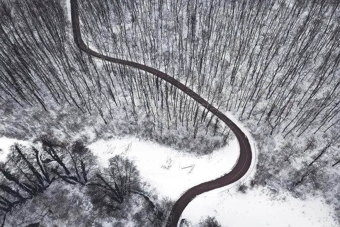 Framed Print : Winter forest and Road. Top view
