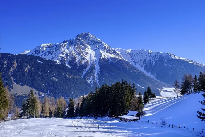 Framed Print : Winter hiking trail to the Reschenalm