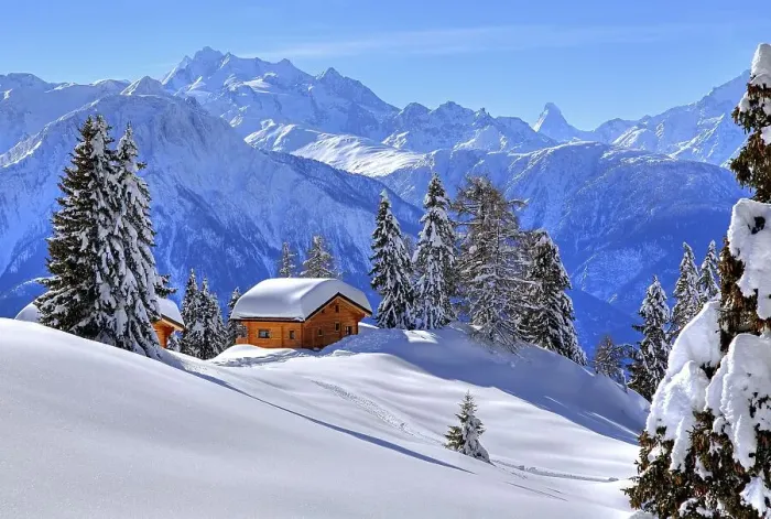 Framed Print : Winter landscape with deep snow-covered chalets