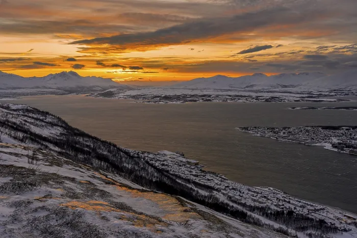 Framed Print : Winter view from Mount Storsteinen to the southern tip of Tromso at sunset