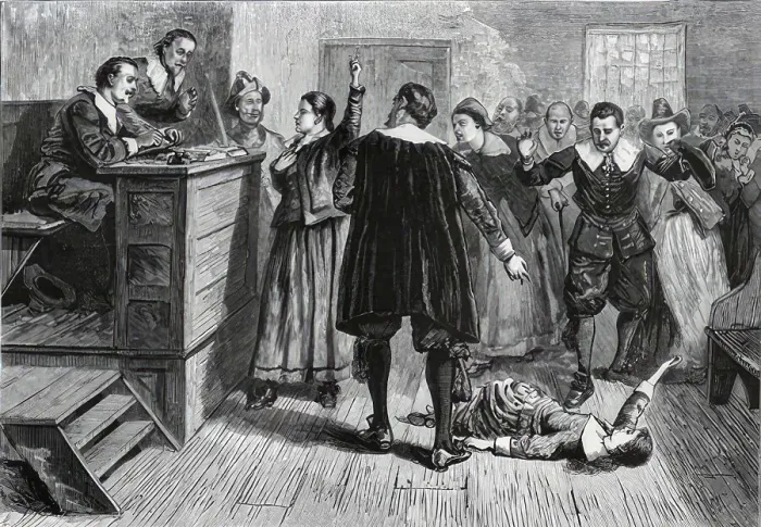 Framed Print : Witch trial, the accused witch has fainted in the courtroom