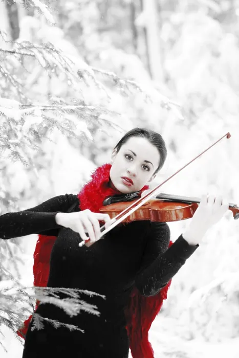 Framed Print : Woman, 19 years, with violin in a snowy winter landscape