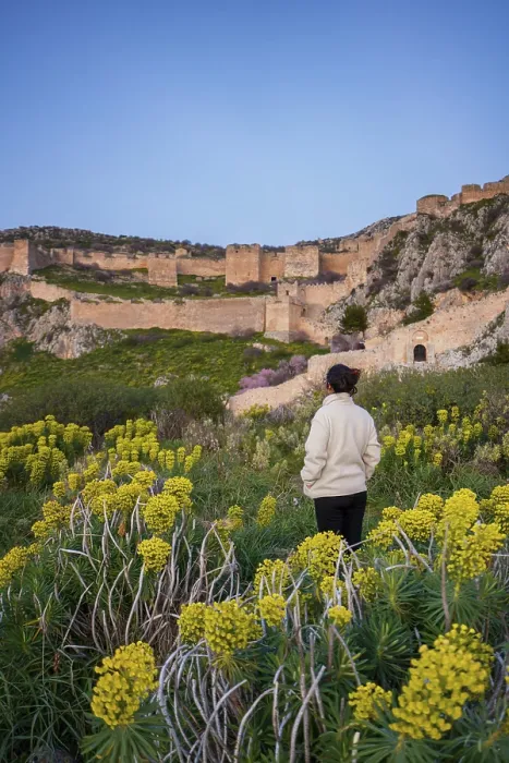 Framed Print : A woman admires the ancient Greek fortress Framed Print : A woman admires the ancient Greek fortress