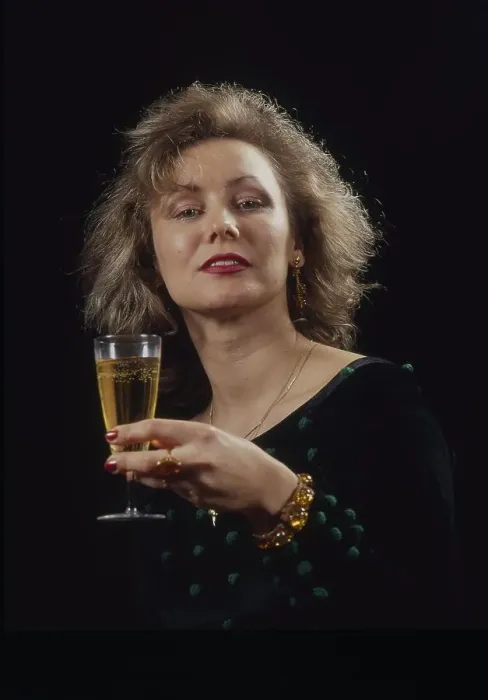 Framed Print : Woman with champagne glass in hand