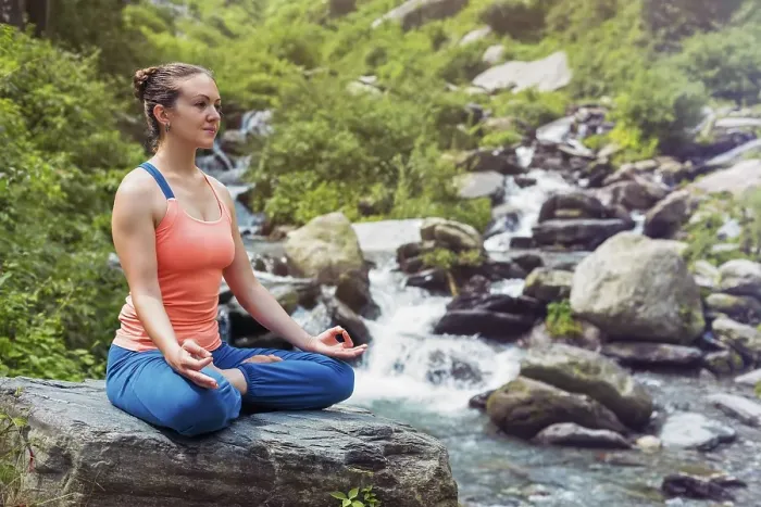 Framed Print : Woman in Hatha yoga asana Padmasana outdoors at tropical waterfall Framed Print : Woman in Hatha yoga asana Padmasana outdoors at tropical waterfall