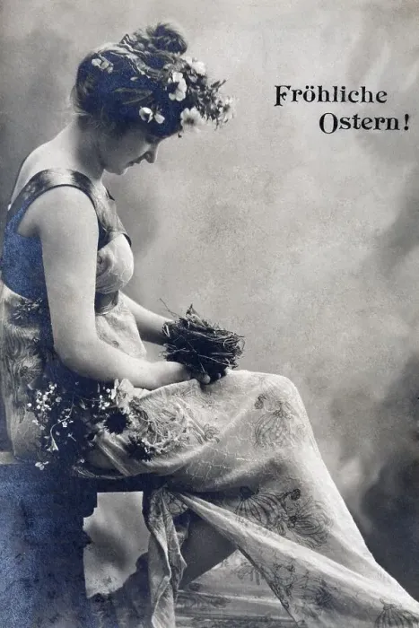 Framed Print : Woman holding nest with young bird