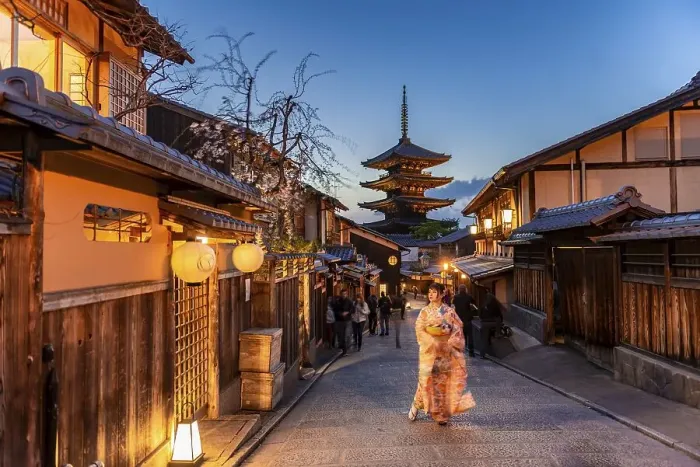 Framed Print : Woman in kimono in a lane, Yasaka dori historical alleyway in the old town with traditional Japanese houses