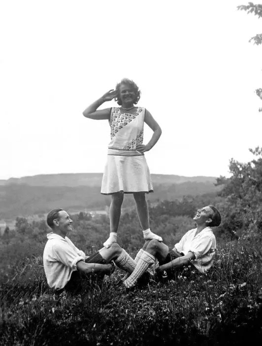 Framed Print : Woman on the knees of two men, 1930s