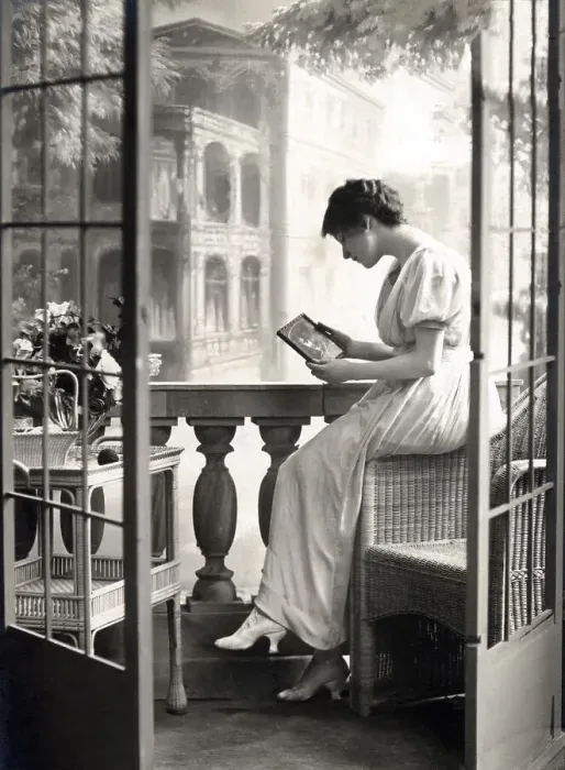 Framed Print : Woman longingly holding a picture of her man