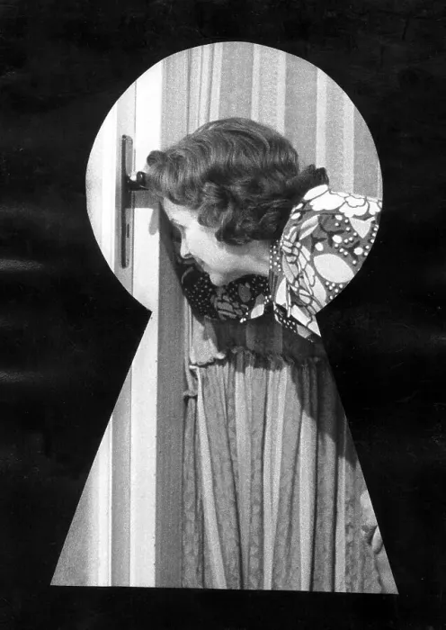 Framed Print : Woman looking through a keyhole, ca Framed Print : Woman looking through a keyhole, ca