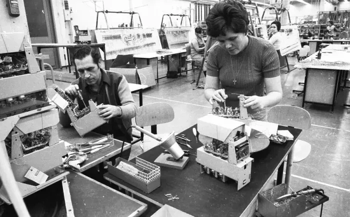 Framed Print : Many woman and a few men work at jobs at Standard Elektrik Lorenz (SEL)