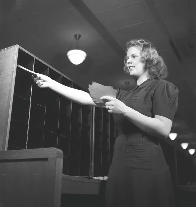 Framed Print : A woman in an office in 1942 Framed Print : A woman in an office in 1942