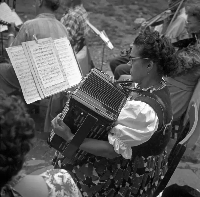 Framed Print : Woman plays accordion after notes Framed Print : Woman plays accordion after notes