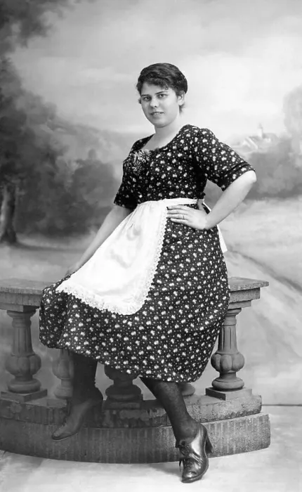 Framed Print : Woman posing with apron, maid, 1920s Framed Print : Woman posing with apron, maid, 1920s