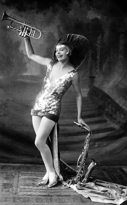 Framed Print : Woman with saxophone and trumpet