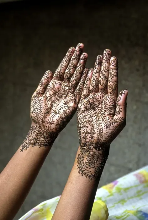 Framed Print : A woman showing mehandi henna applied hands