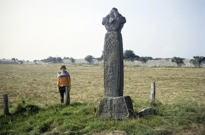 Framed Print : Woman standing in the field at Penmon Cross c. 1000 AD, Penmon Priory, Anglesey, North Wales, UK 1966 Framed Print : Woman standing in the field at Penmon Cross c. 1000 AD, Penmon Priory, Anglesey, North Wales, UK 1966