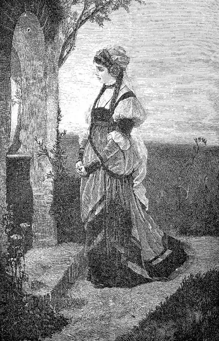 Framed Print : Woman stands in front of a small field chapel and prays Framed Print : Woman stands in front of a small field chapel and prays