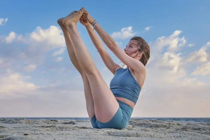Framed Print : A woman in Ubhaya Padangusthasana