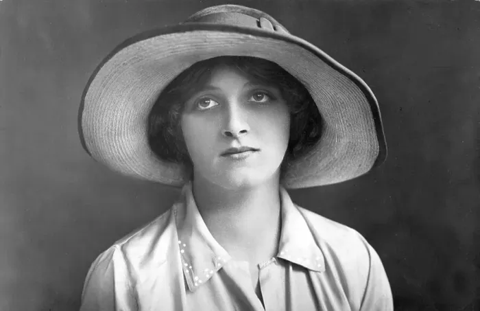 Framed Print : Woman wearing a hat, historical photo