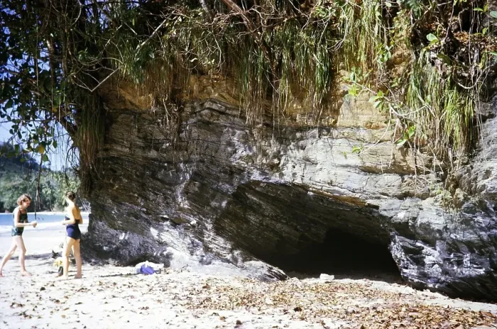 Framed Print : Two women on beach wearing swimwear next to cave, Las Cuevas, Trinidad, Trinidad and Tobago 1961-1963