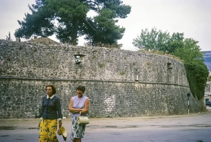 Framed Print : Two women walking in street, fortress stone city walls, Trebinje, Bosnia and Herzegovina, former Yugoslavia, Europe 1970, Europe