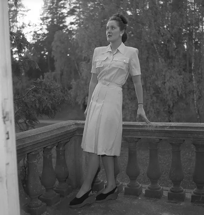 Framed Print : Women's fashion in the 1940s. A young woman photographed for a ladies magazine to show the women's fashion of 1945