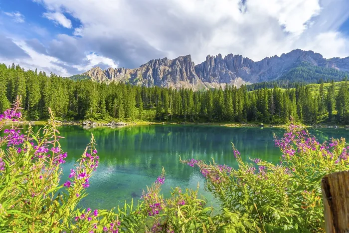Framed Print : Wonderful aerial view of lake carezza reflecting latemar mountain range in the dolomites on a sunny summer day Framed Print : Wonderful aerial view of lake carezza reflecting latemar mountain range in the dolomites on a sunny summer day