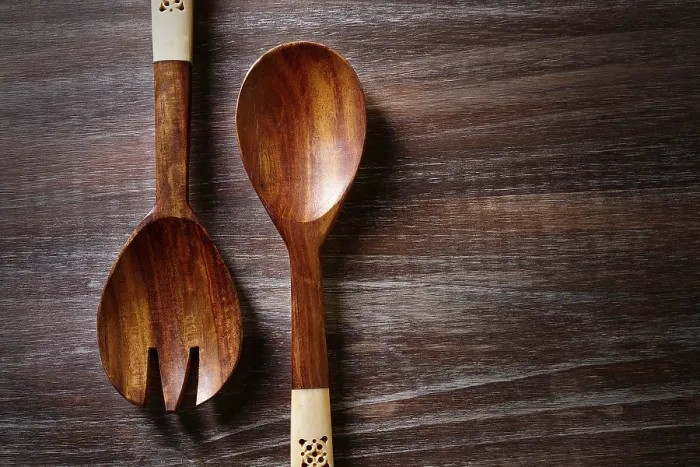 Framed Print : Wood spoon and fork on wooden board kitchen tools