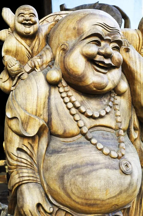Framed Print : Wooden Buddha figurines near Ubud, Bali, Indonesia