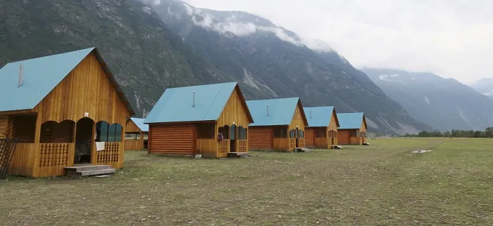 Framed Print : Wooden camping cabins near mountains Framed Print : Wooden camping cabins near mountains
