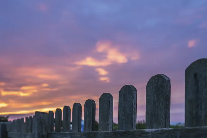 Framed Print : Wooden fence and the beautiful sky at sunset over the Cornish coast