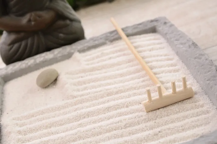 Framed Print : Wooden fork of a small Zen garden