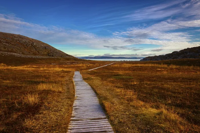 Framed Print : Wooden path in the open-air museum of Forsol towards the bay