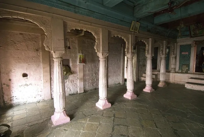 Framed Print : Wooden and pink pillars in temple at Shivneri fort
