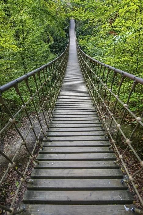Framed Print : Wooden suspension bridge over a gorge Framed Print : Wooden suspension bridge over a gorge