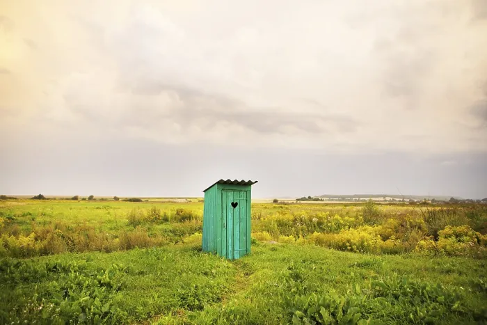 Framed Print : Wooden toilet with a carved window in the shape of a heart