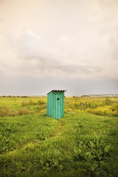 Framed Print : Wooden toilet with a carved window in the shape of a heart