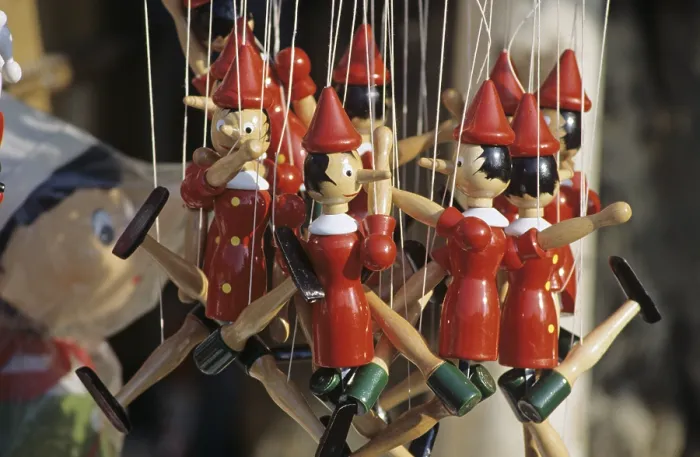 Framed Print : Wooden toy figures of Pinocchio in Collodi Tuscany Italy