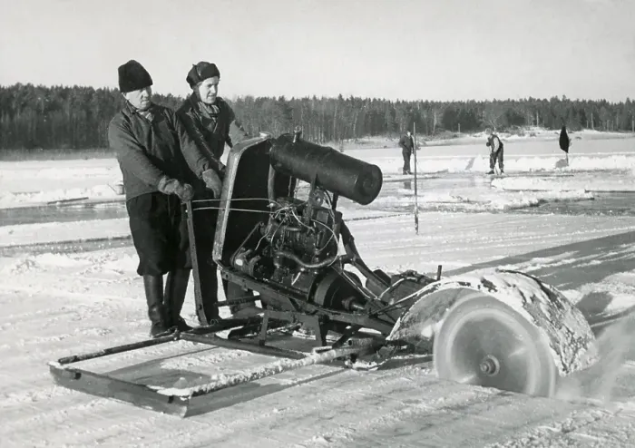 Framed Print : Workers collecting ice. Two men are sawing blocks of ice to use in homes to keep groceries cool