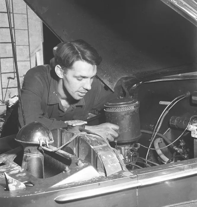 Framed Print : Working on the engine 1946. A mechanic in a garage is seen working on the motor and the air filter. Sweden 1961. Kristoffersson ref U14-2 Framed Print : Working on the engine 1946. A mechanic in a garage is seen working on the motor and the air filter. Sweden 1961. Kristoffersson ref U14-2