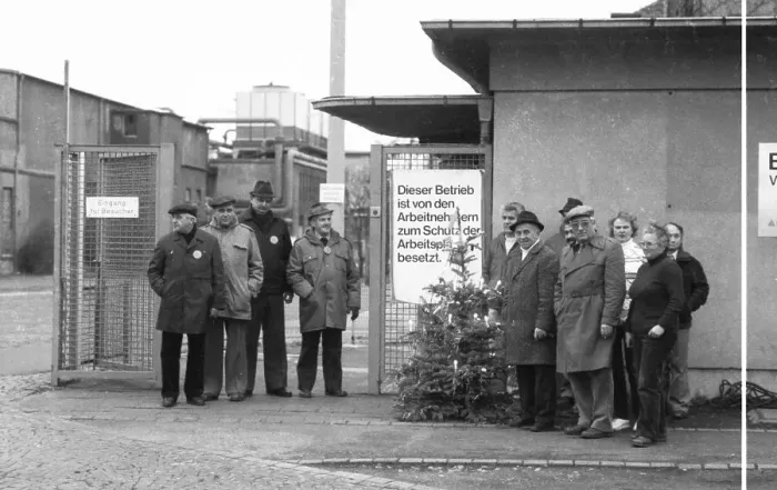 Framed Print : Worried about their jobs, workers and employees occupied their company